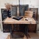 Vintage wooden table with a cast iron base.