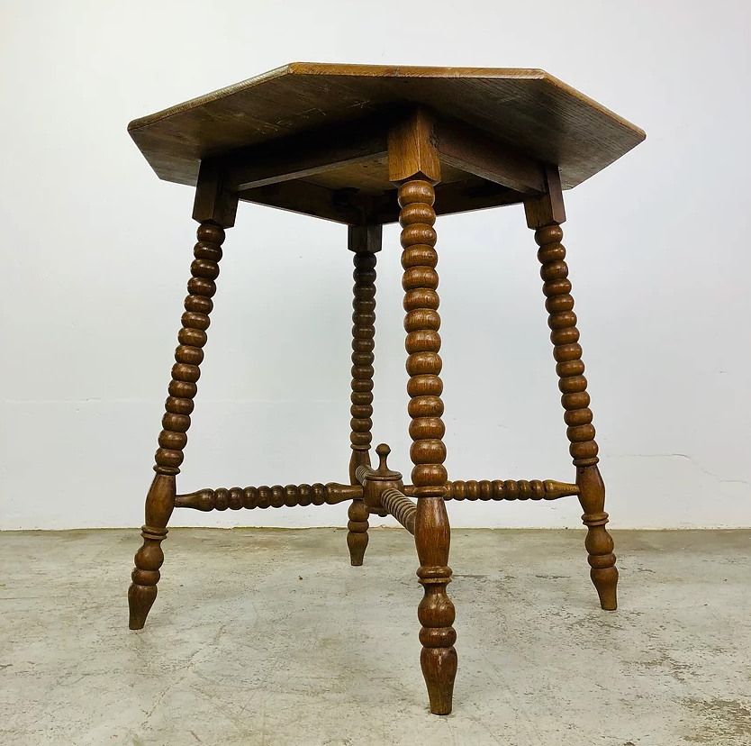 Carved antique wooden table with 8 sides