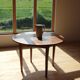 Round table in raw wood