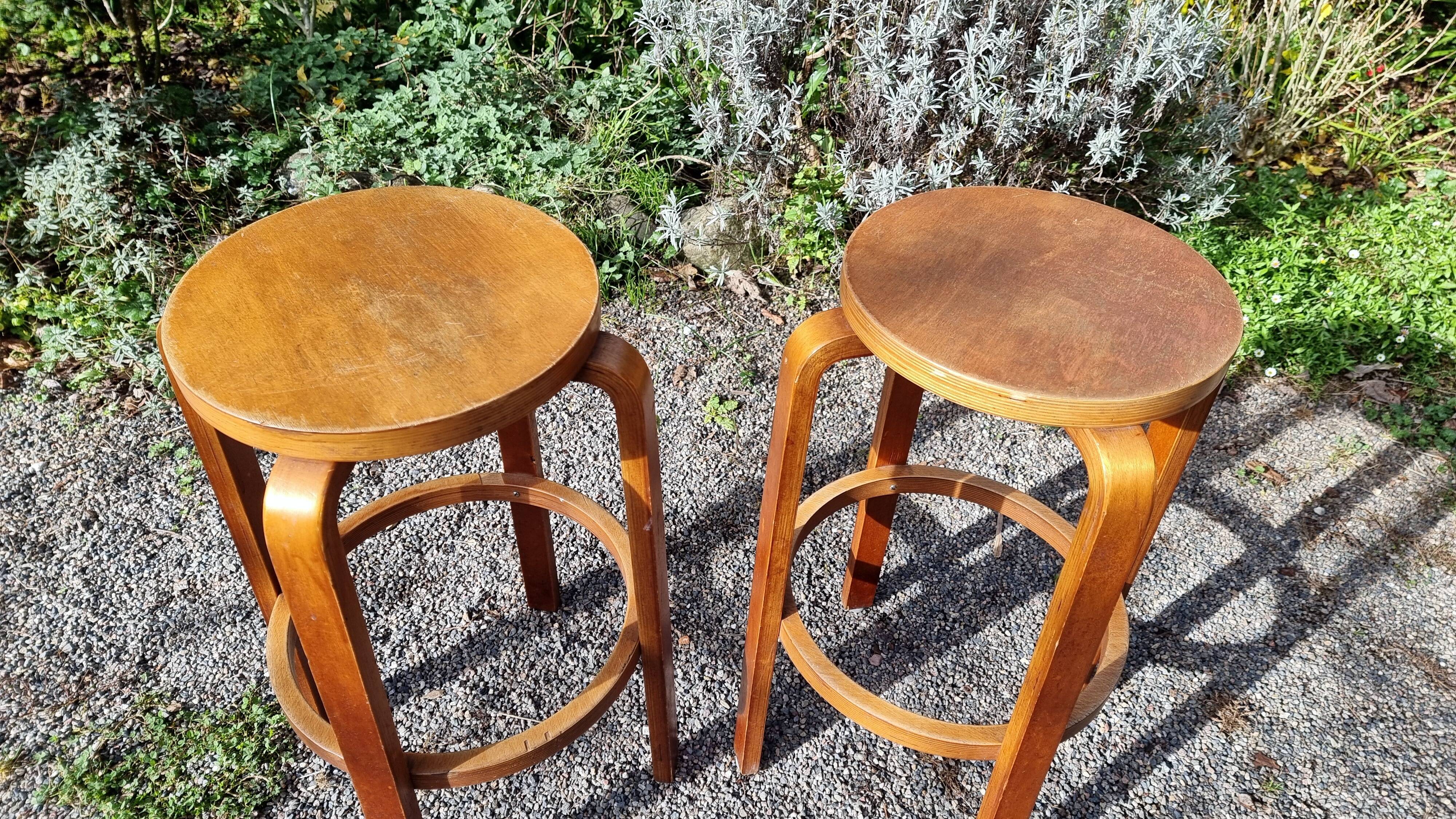 Pair of Artek type 64 bar stools from the 80s