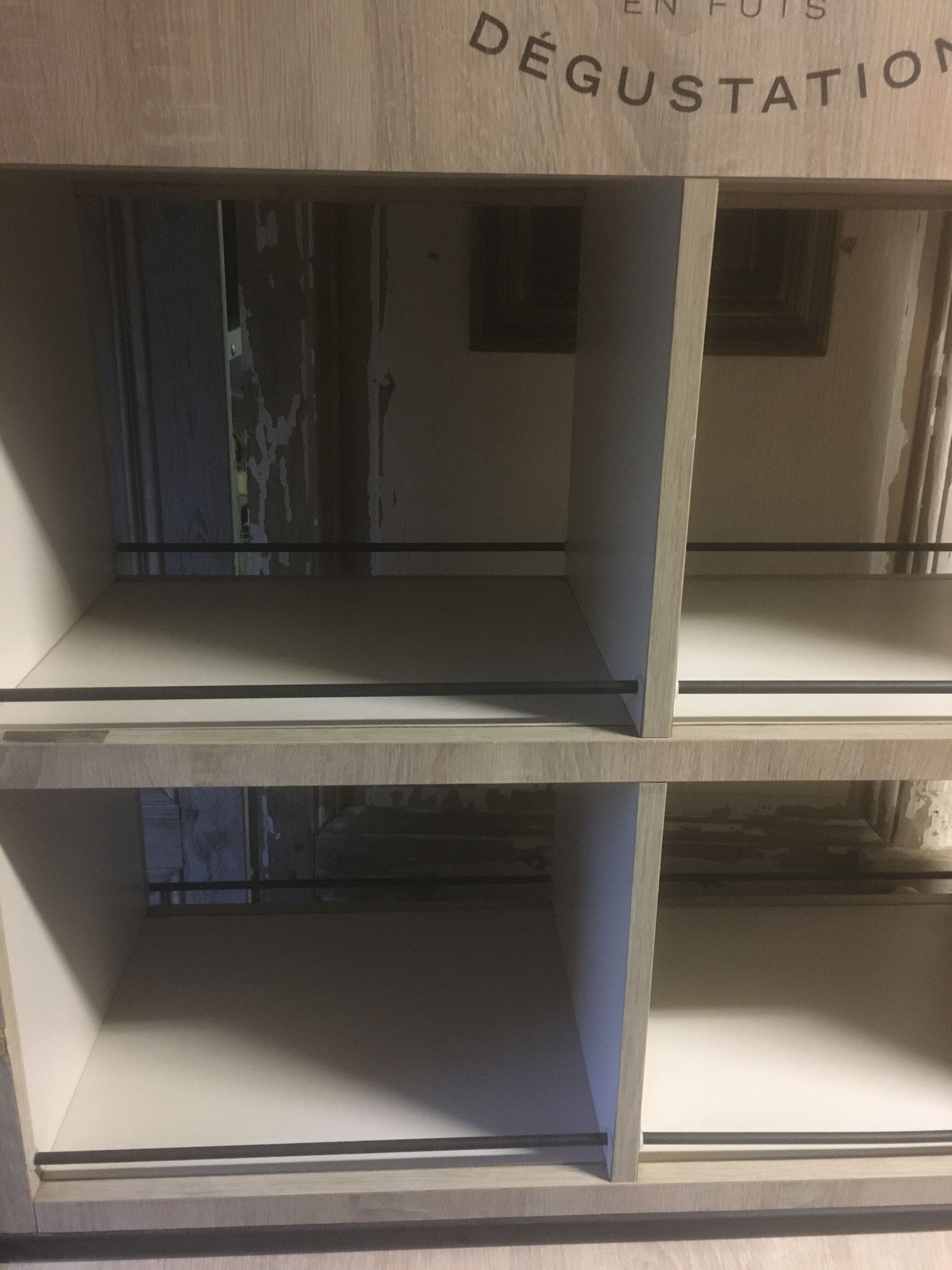 Store display for whisky and rum in metal and melamine