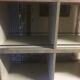 Store display for whisky and rum in metal and melamine