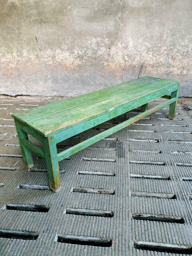 Old wooden bench sidetable green