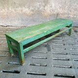 Old wooden bench sidetable green