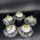 Set of 5 scalloped white opaline flower pendants, braided black cable.