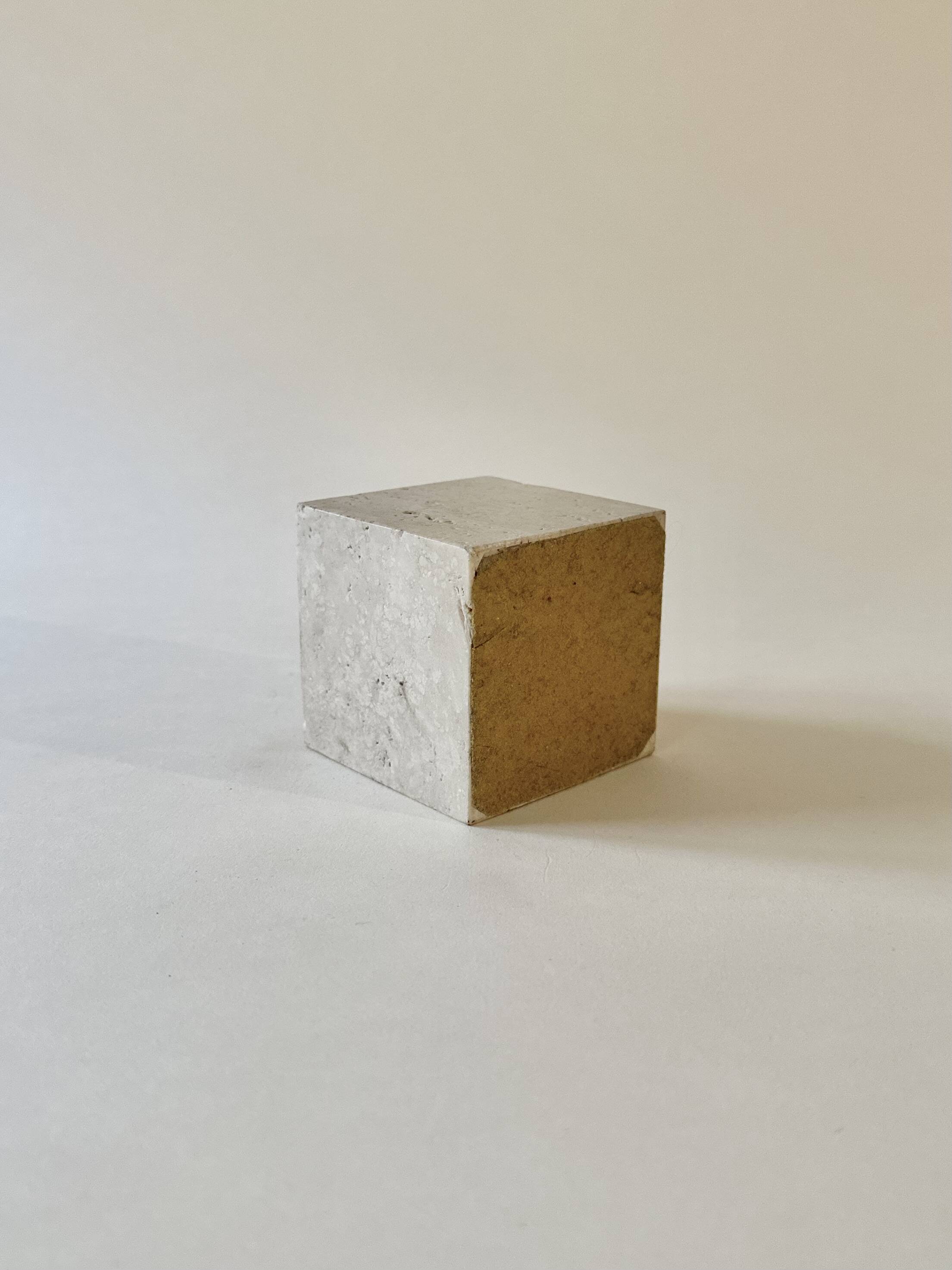 Travertine open-air cube