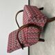 C-shaped lounge chair by J. Halabala