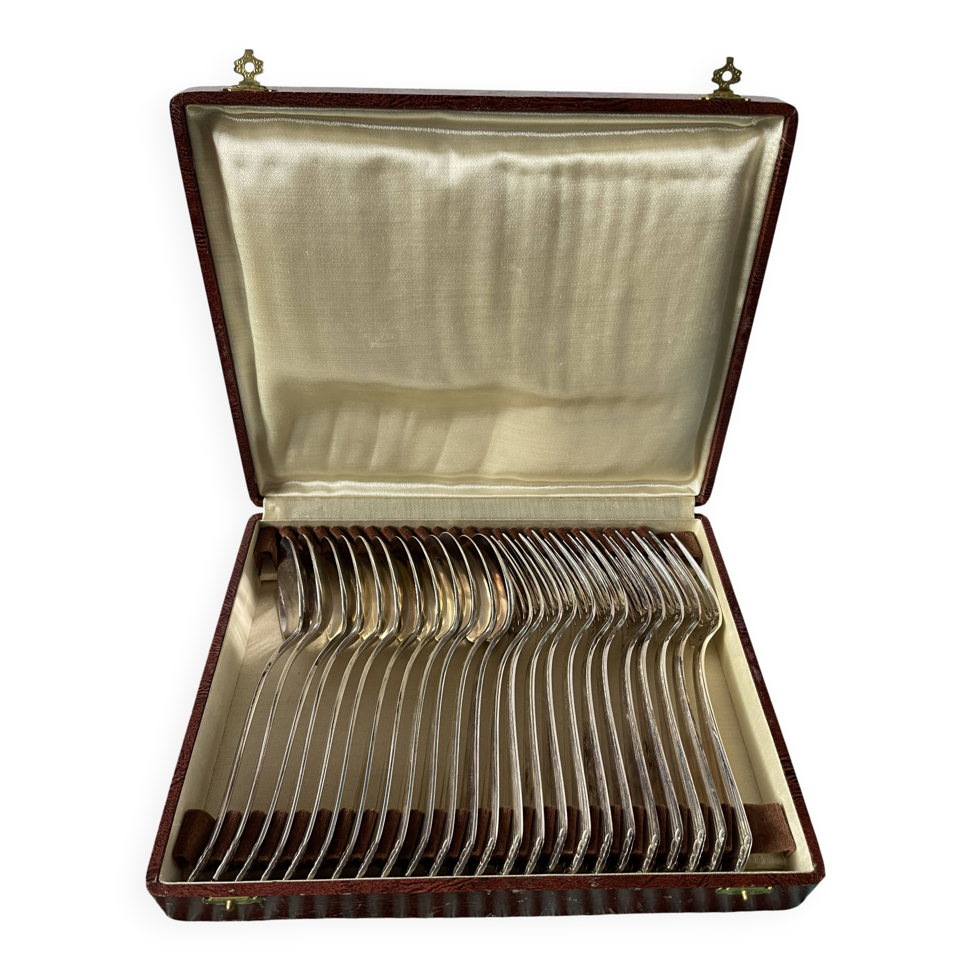 Ménagère de 24 couverts en métal argenté