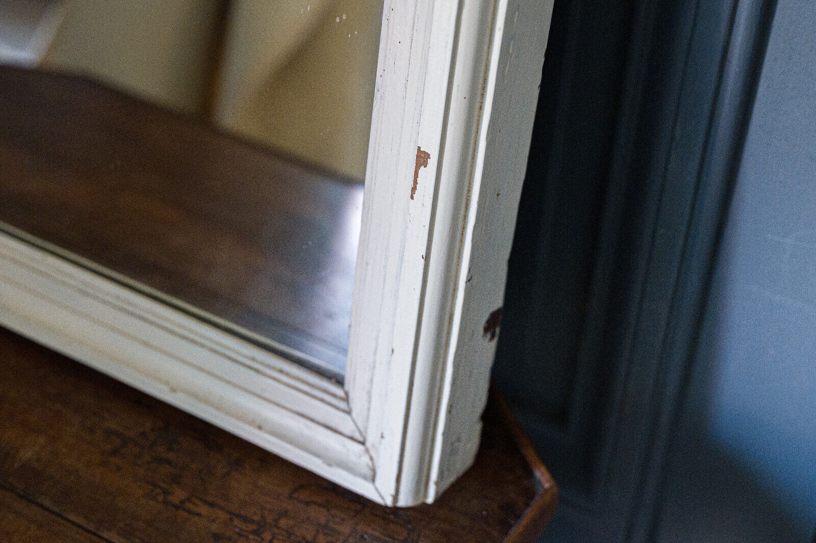 Wooden mirror Early twentieth Creamy white patina Original background