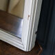 Wooden mirror Early twentieth Creamy white patina Original background