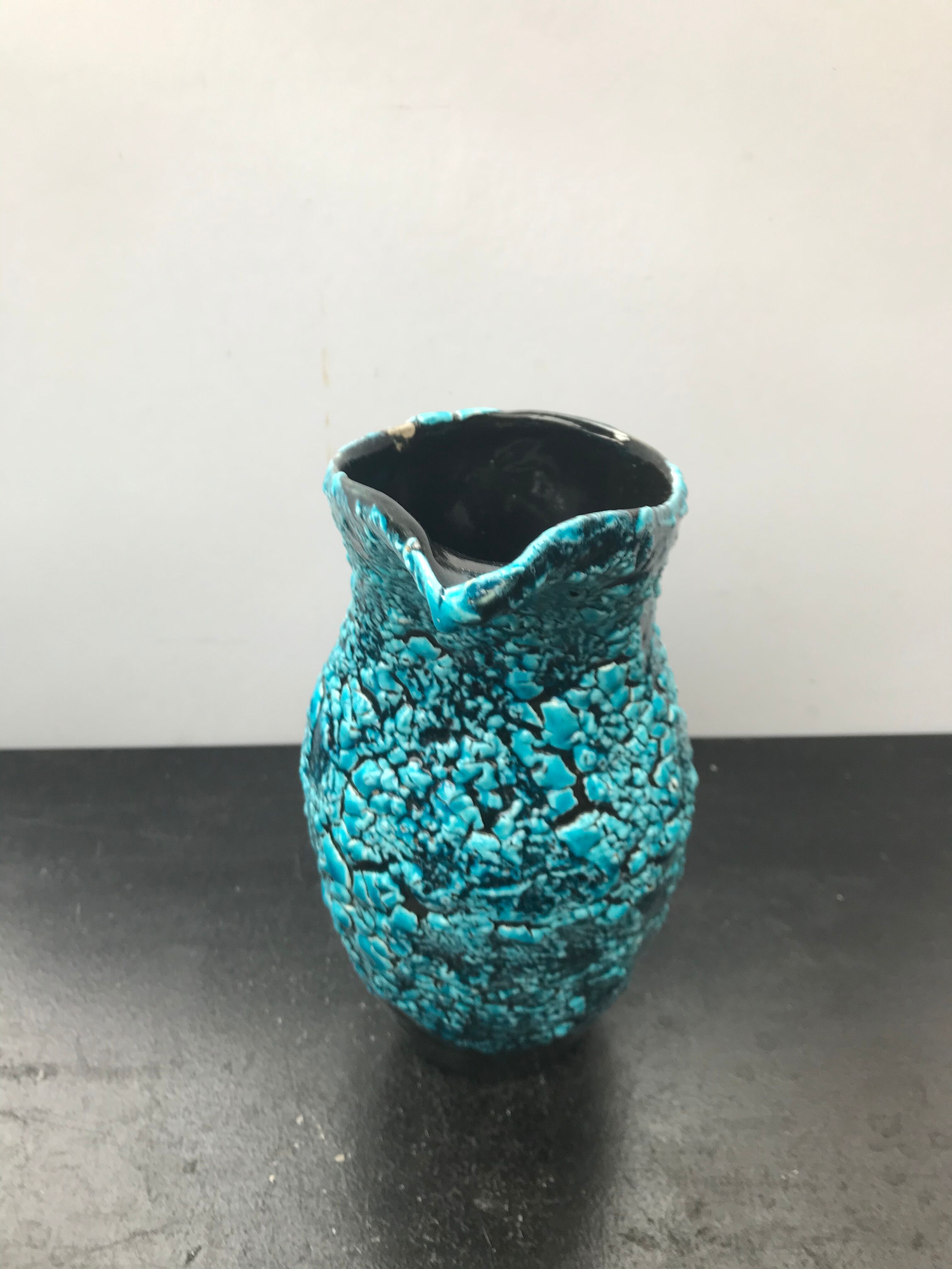 Former black ceramics pitcher