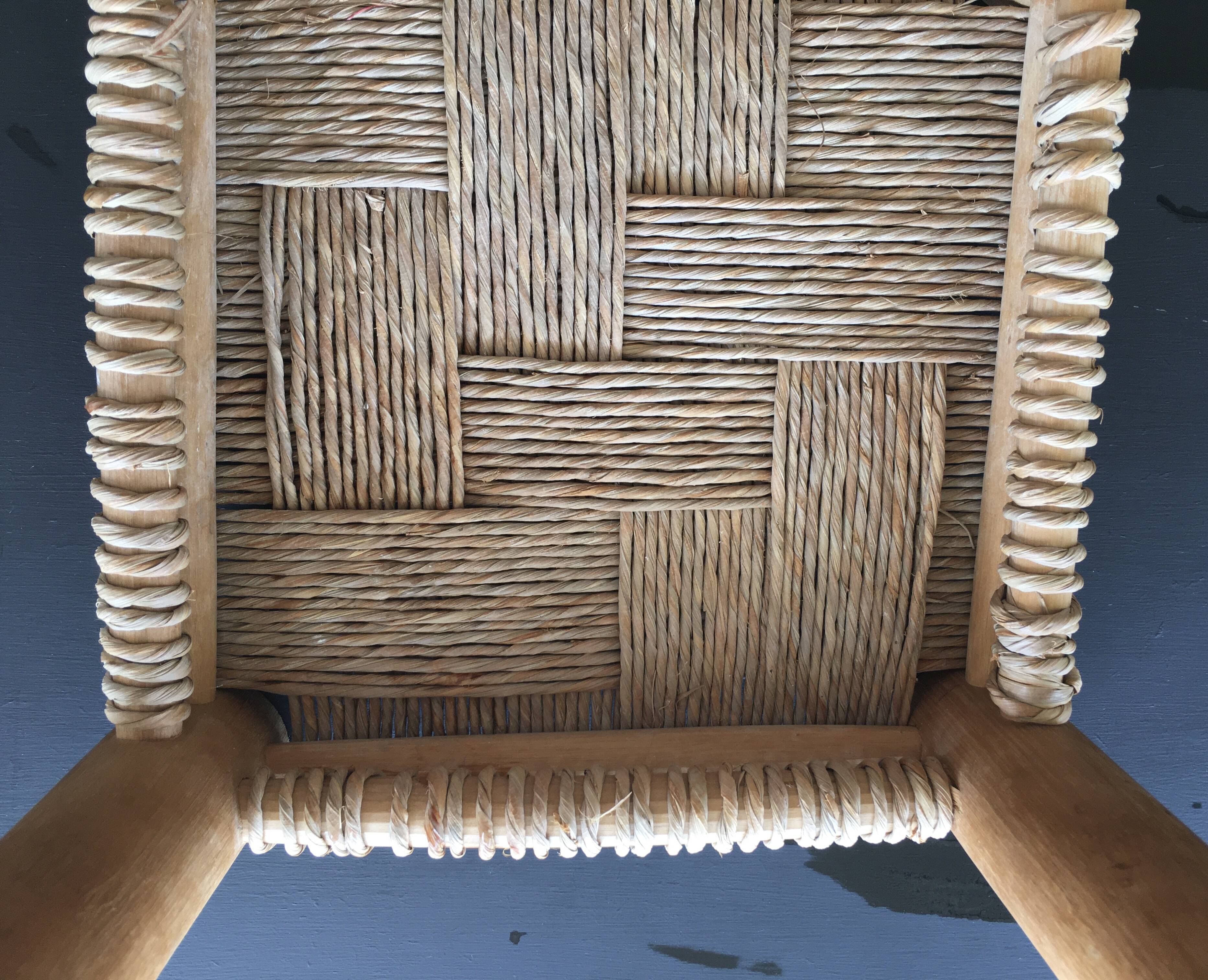 Wooden stool seated in braided rope