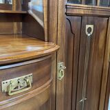Art Nouveau mahogany buffet with clock in the style of G. Serrurier Bovy.