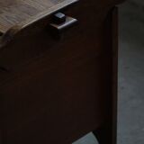 Modern Danish oak commode with decorative relief sculpture, mid-20th century.