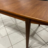 Large extendable Scandinavian table in vintage teak from the 1970s.