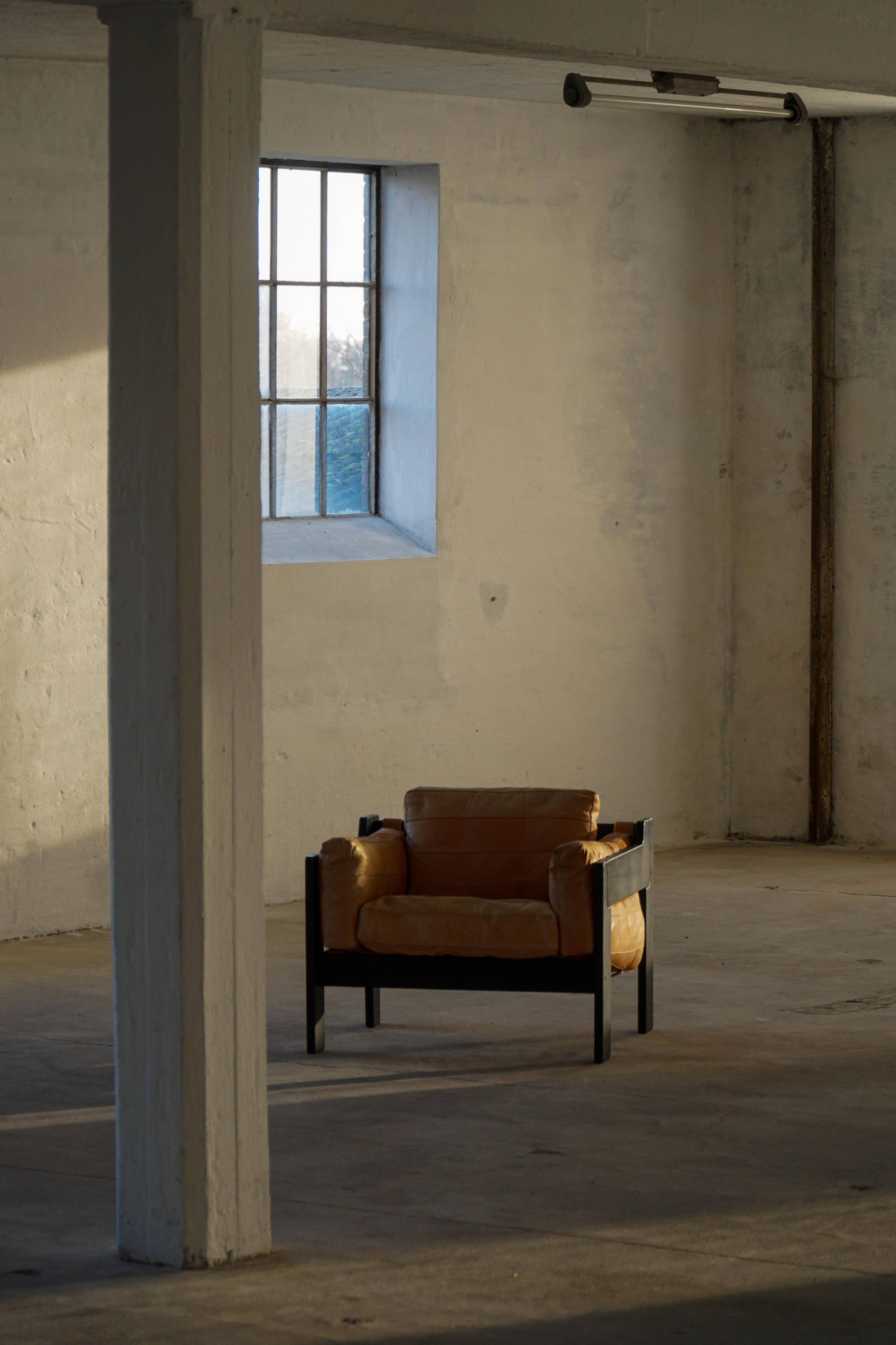 Pair of Easy chairs by Rud Thygesen & Johnny Sørensen in wood and leather, 1970s.