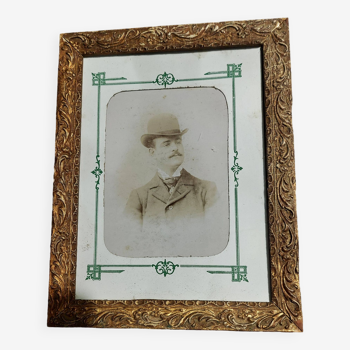 Old framed photo portrait of a man wearing a bowler hat early 20th century