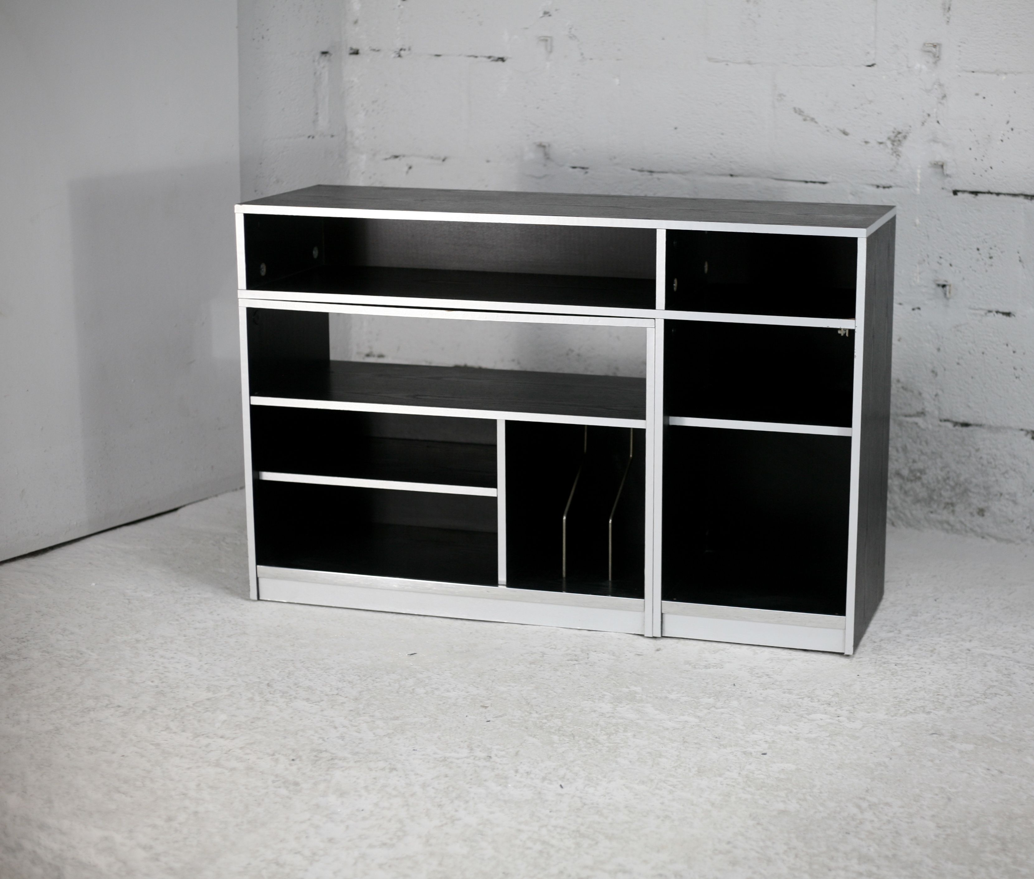 Storage cabinet wood compressed lacquered black lining margins aluminum. France, circa 1975.