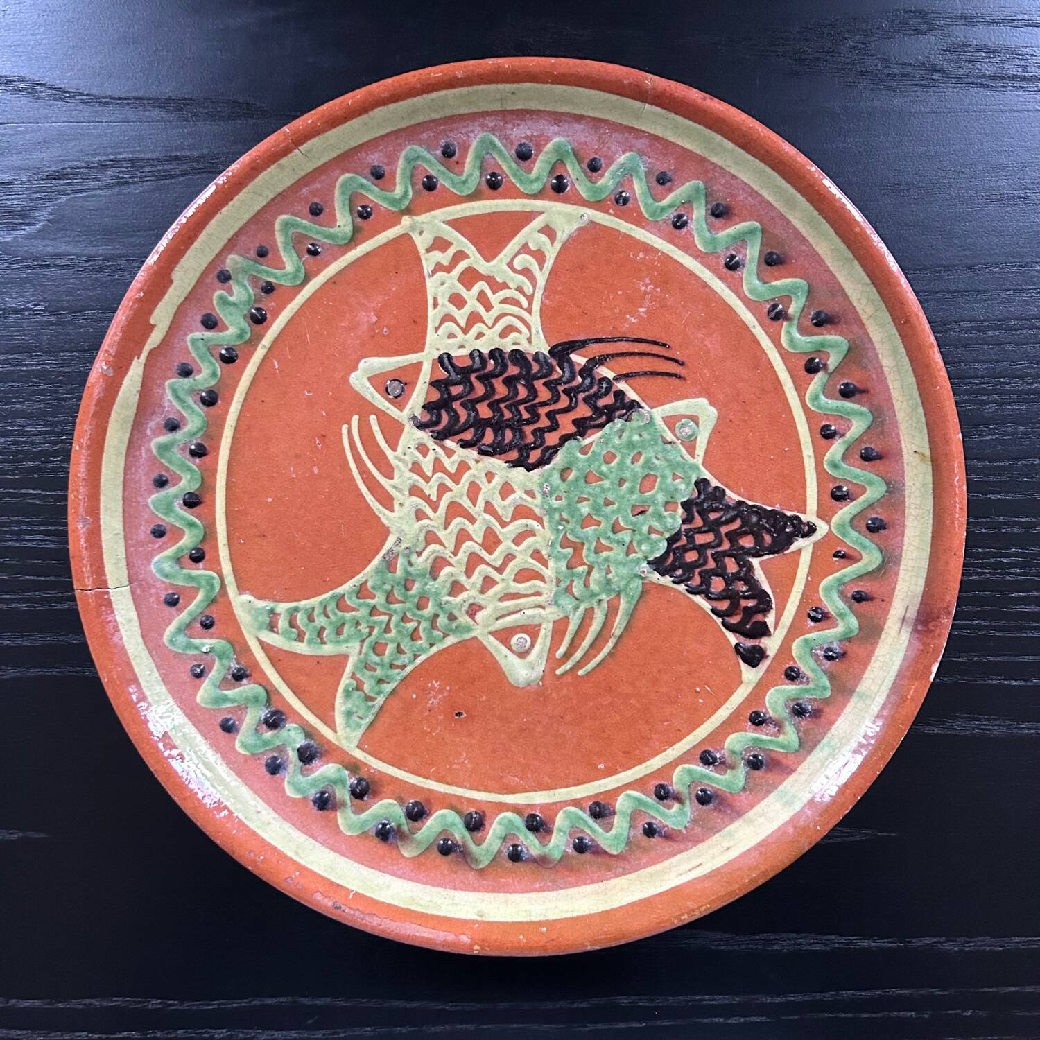 Large handmade dish with fish decoration