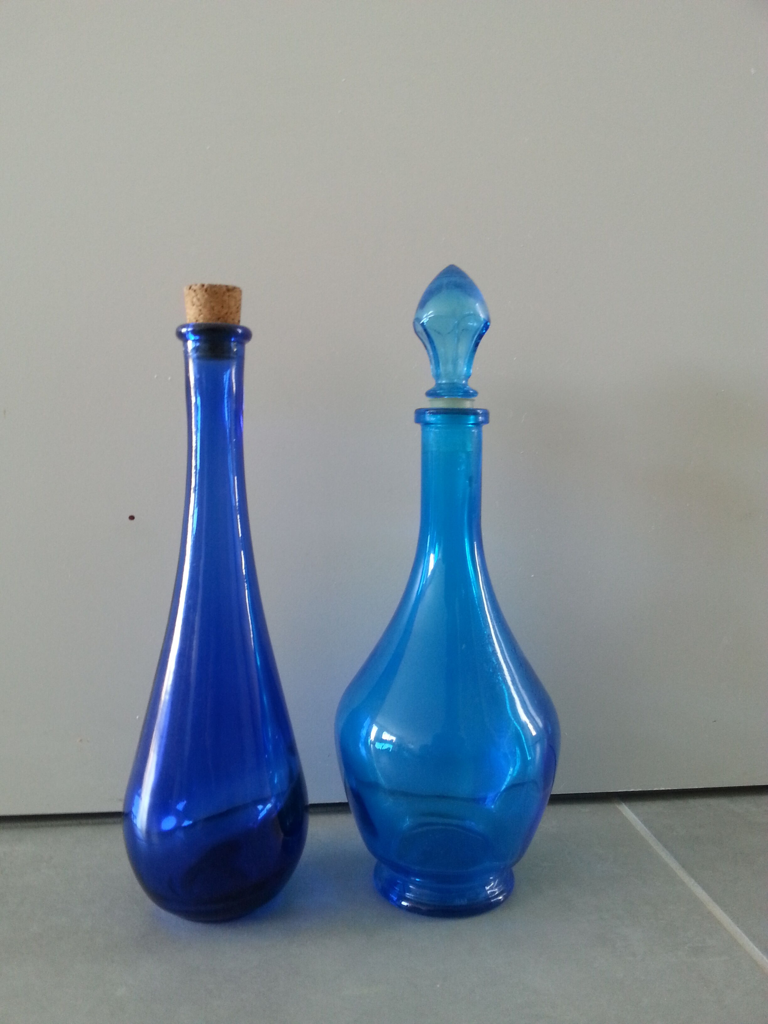 Lot 2 blue glass bottles