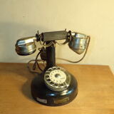 Old Bakelite column and metal phone
