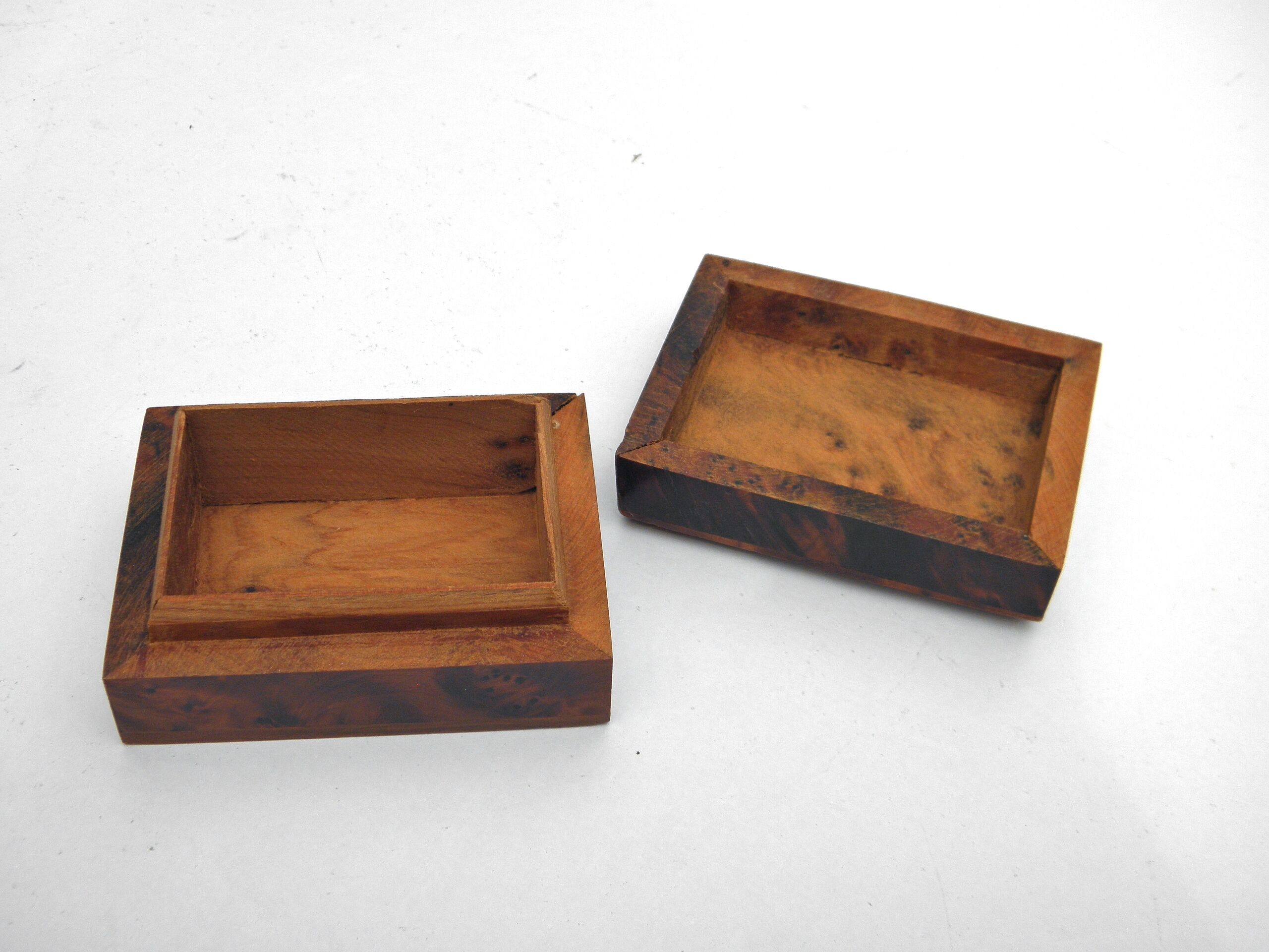 Three boxes in thuya magnifying glass