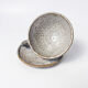 Handcrafted stoneware cup and its saucer – Speckled glaze