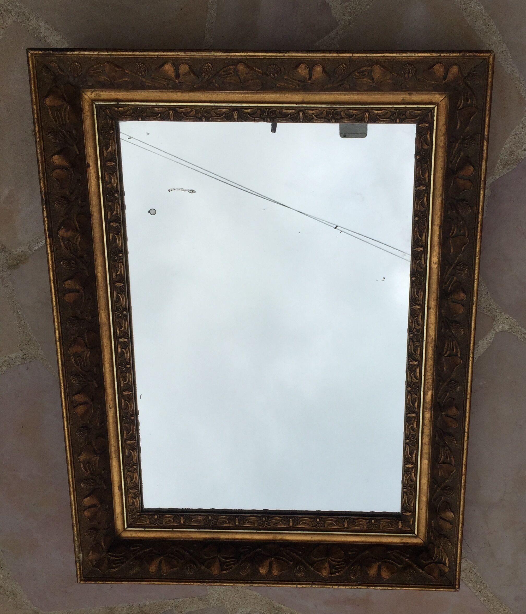 Mirror in gilded wood 66 x 50 cm