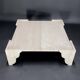 Large square coffee table in travertine by Claude Berraldacci. 1990s. France.