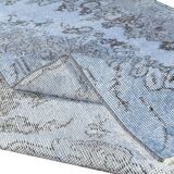 Mid-20th century hand-knotted turkish rug over-dyed in light blue. tek0394
