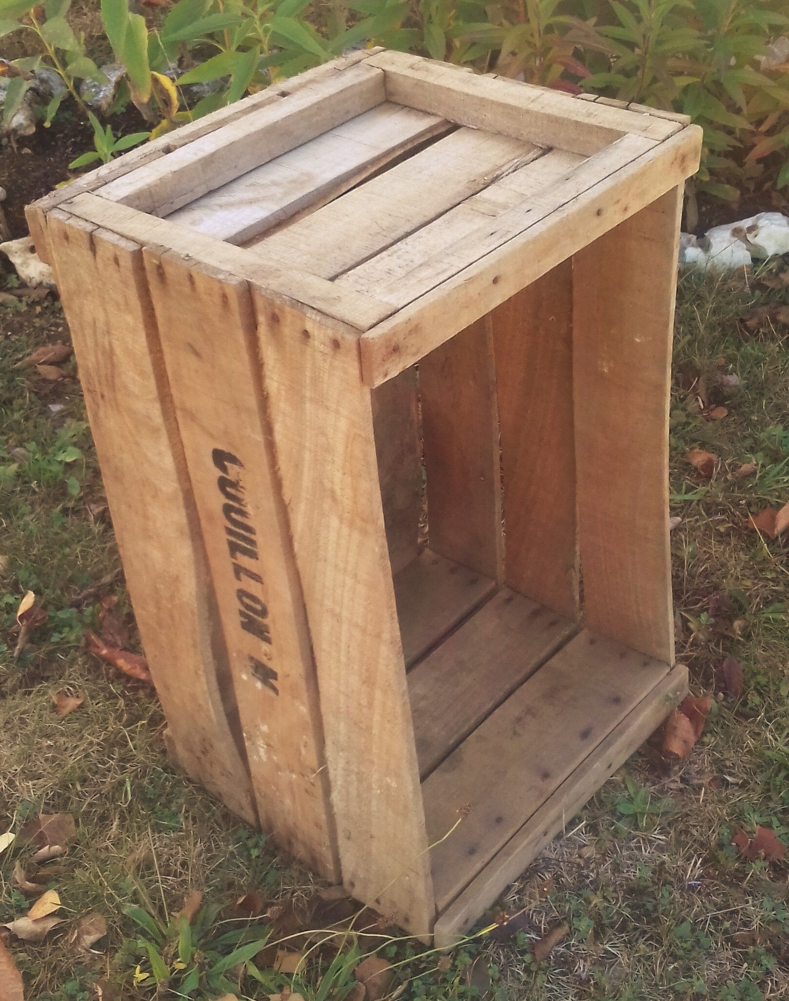 Wooden box with black letters