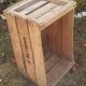 Wooden box with black letters