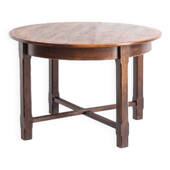 Table à manger vintage avec rallonge centrale. Bois de chêne. France, années 60