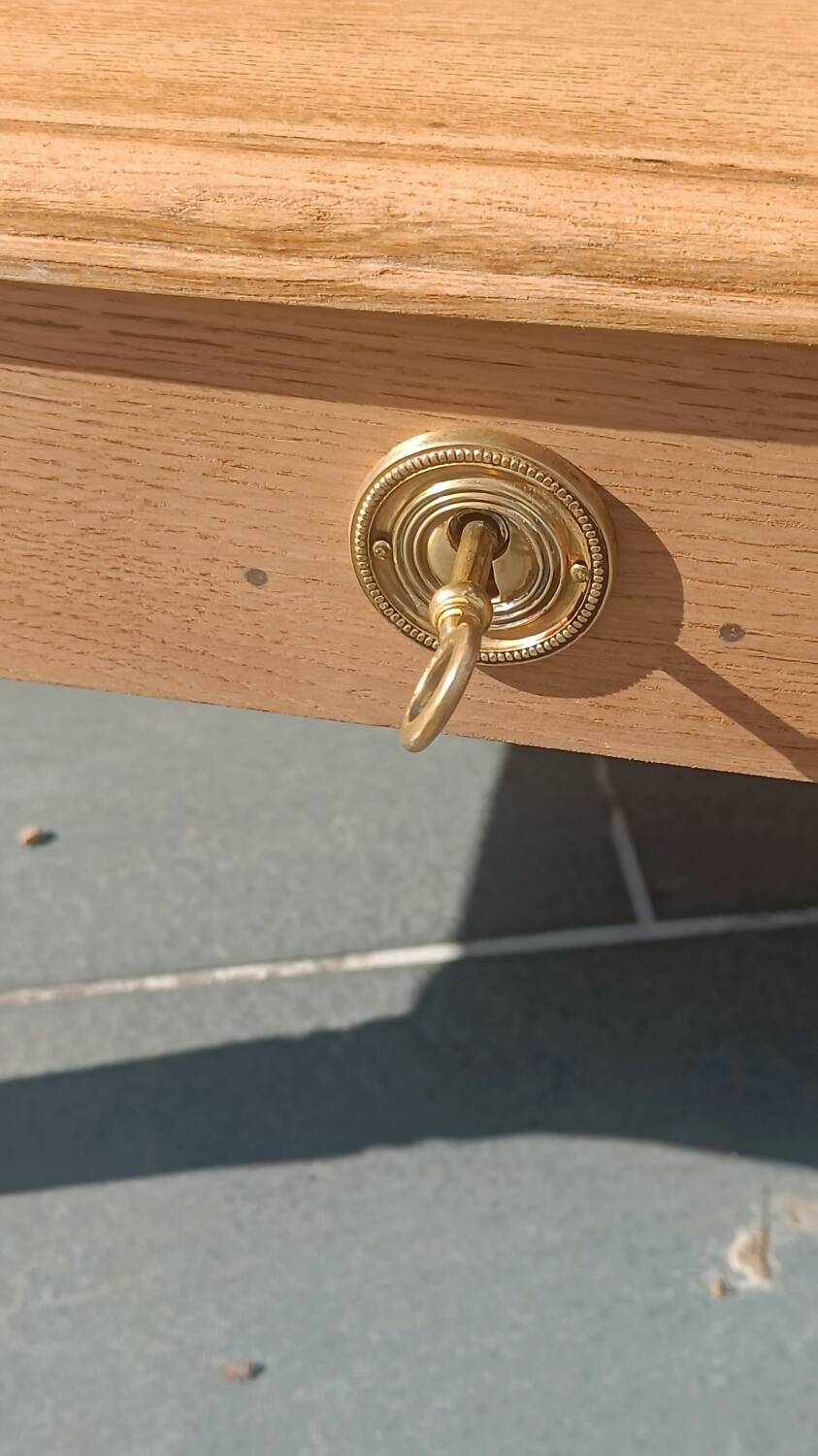 Solid wood coffee table with drawer and original key.