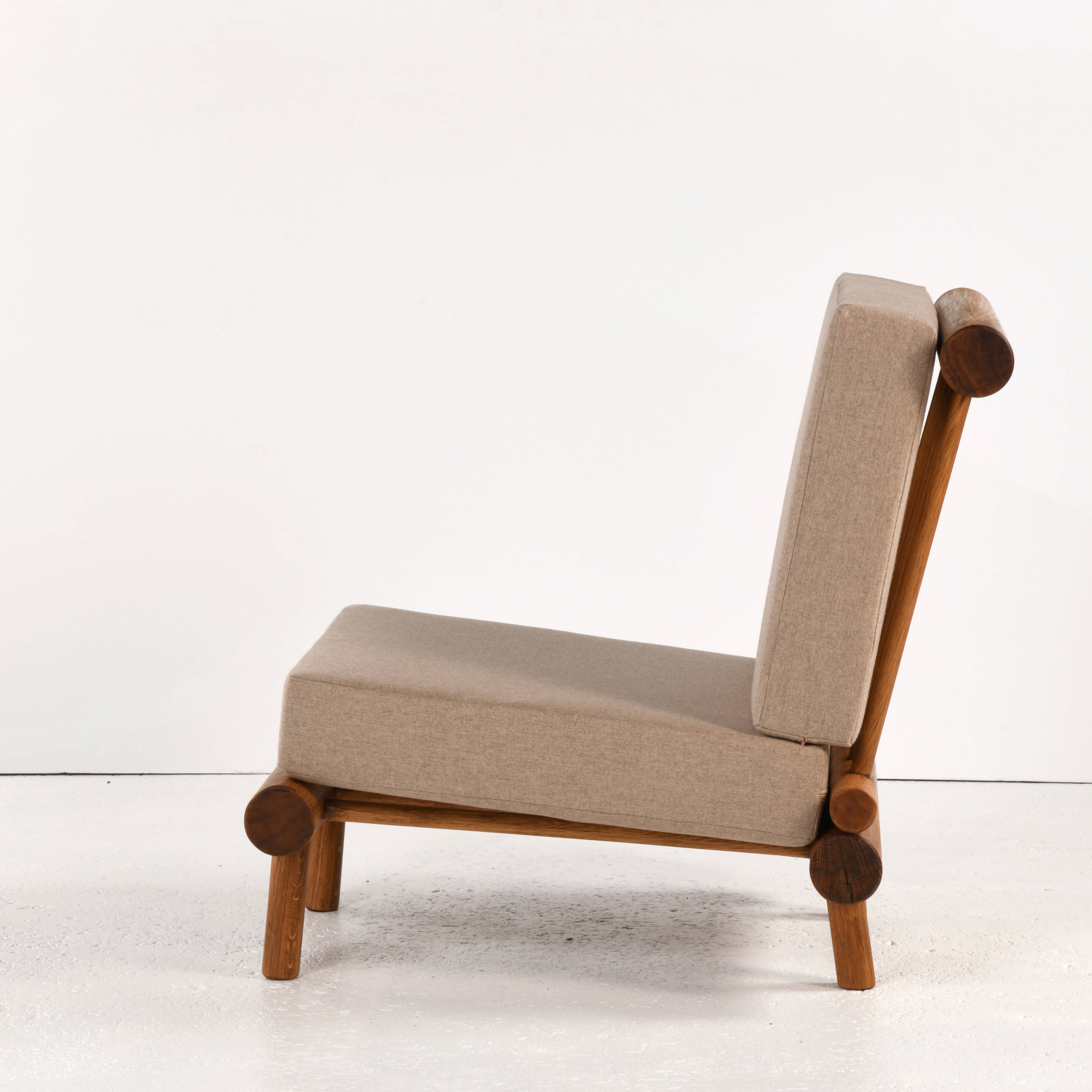 Pair of low chairs called La cachette selected by Charlotte Perriand