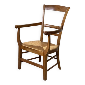 Louis Philippe armchair in walnut and straw, 19th century.