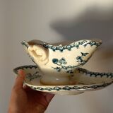 Old gravy boat on frame in terre de fer earthenware by gien, “chardons” model in blue-green