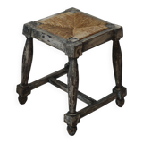 Patinated wooden stool with straw seat