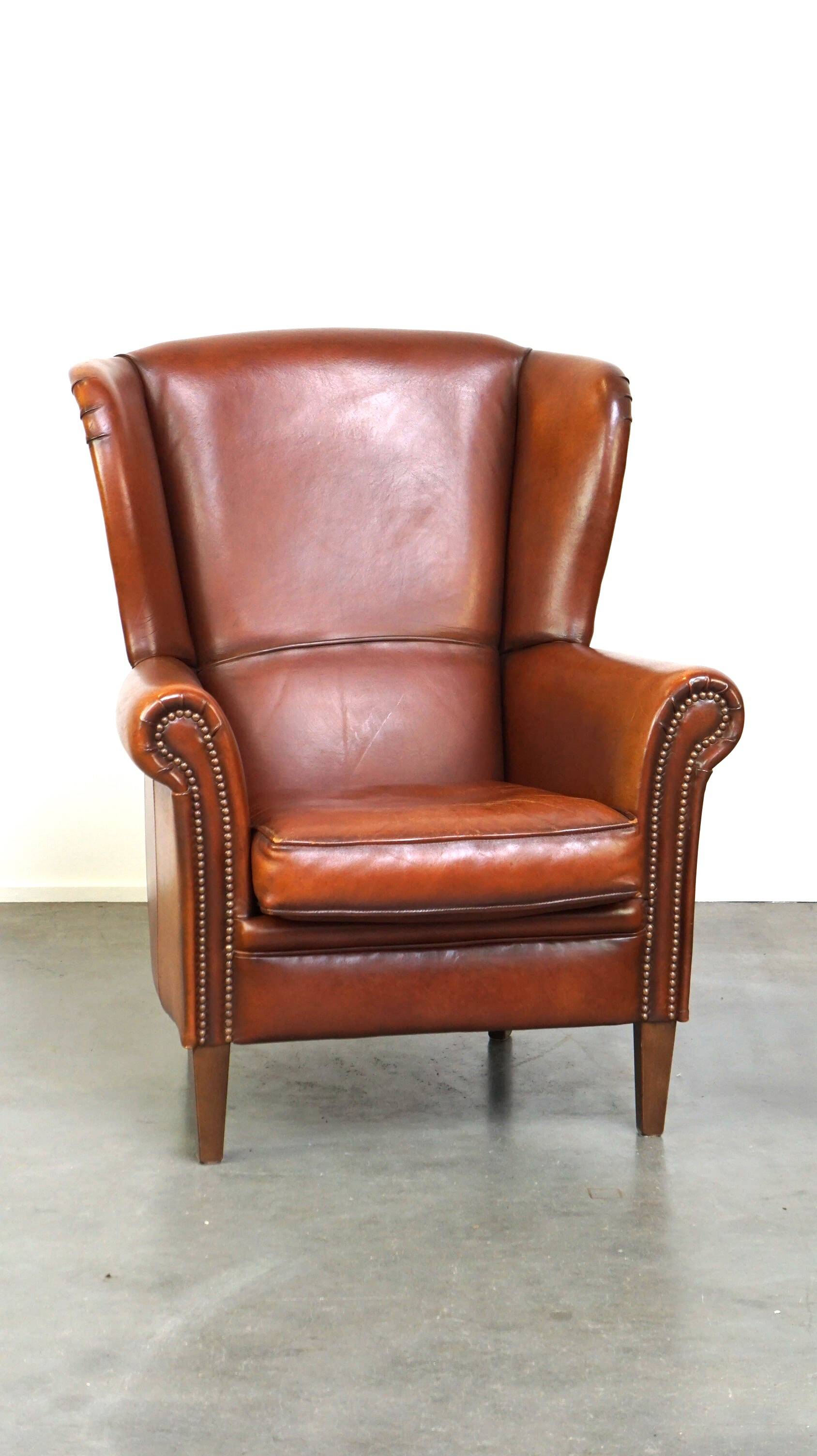 Beautiful classic sheepskin armchair with a beautiful appearance and a comfortable seat