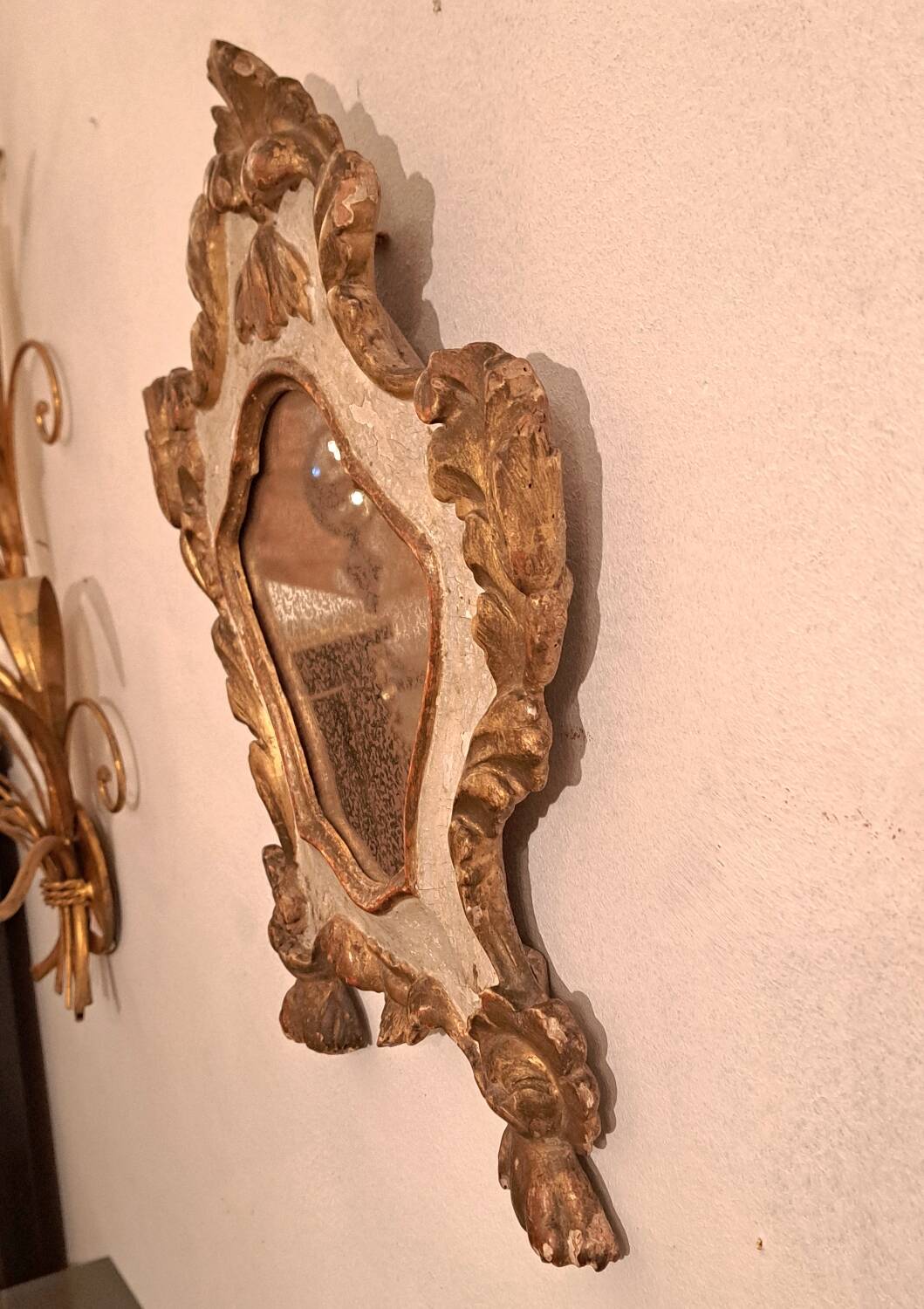18th century Italian mirror in gilded and painted wood
