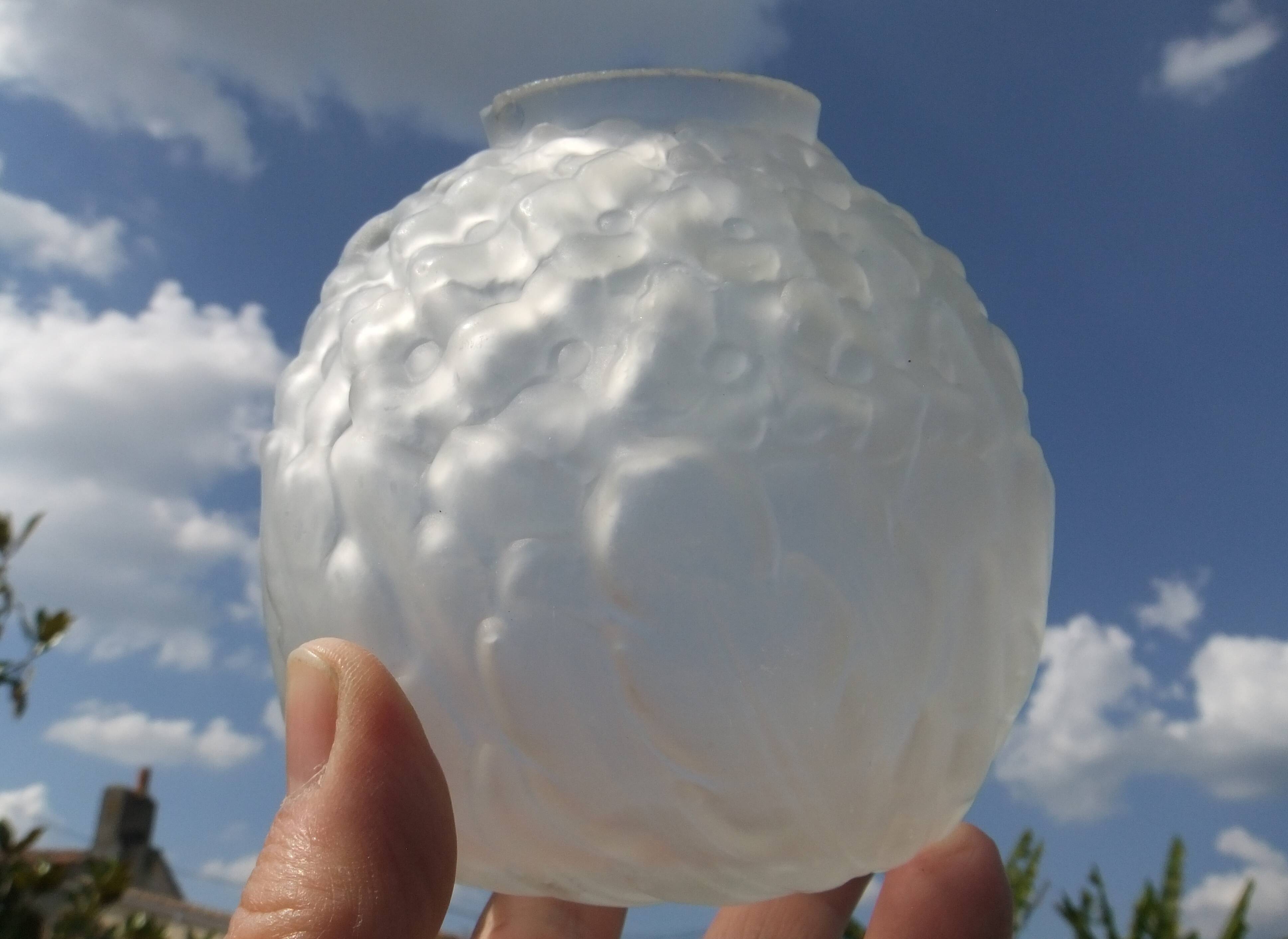 Art Deco ball vase pair with flower and leaf decor