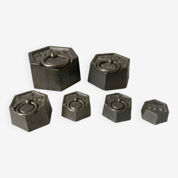 set of old measuring weights early twentieth century