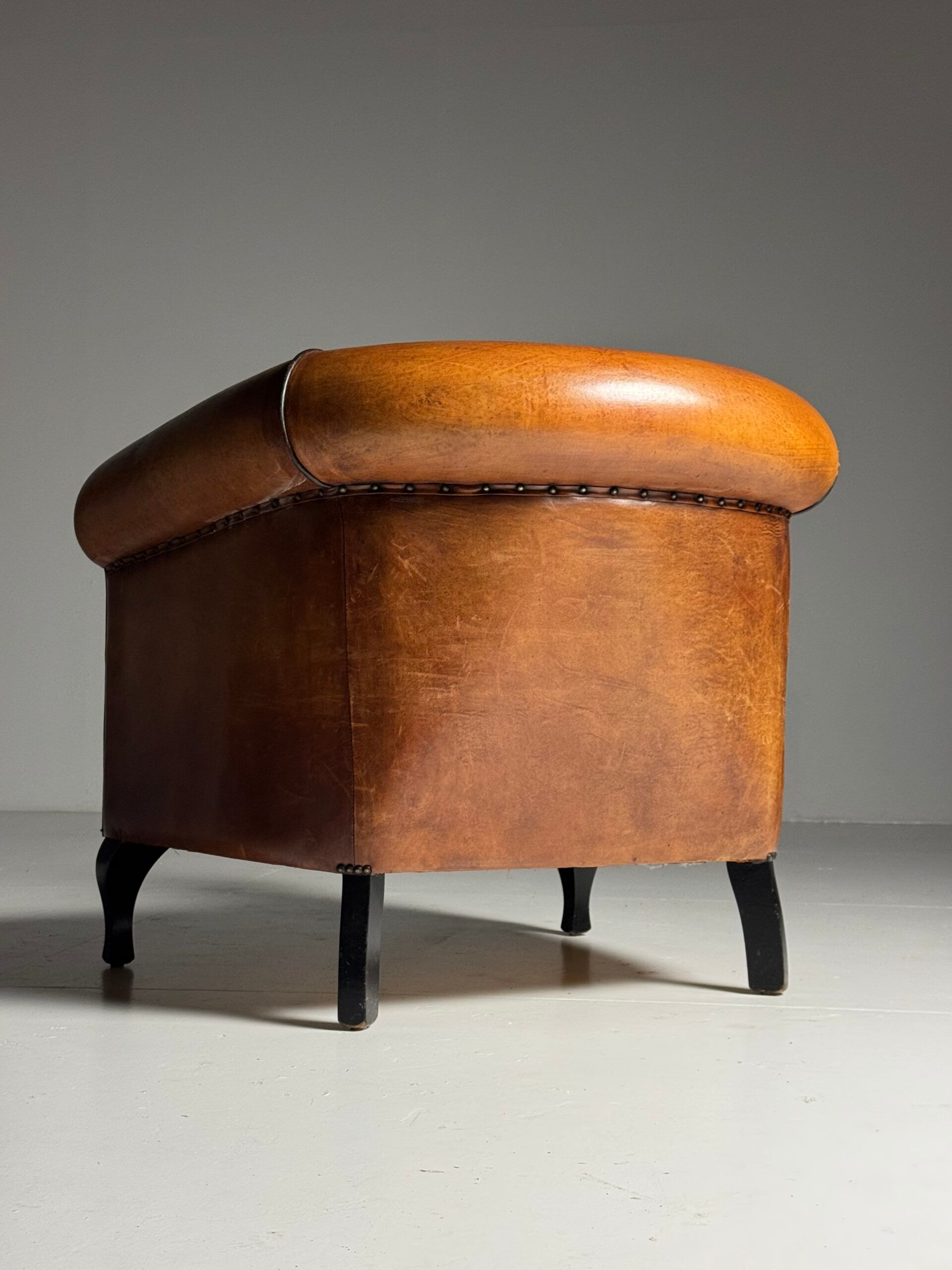 Ensemble de 2 fauteuils club en peau de mouton