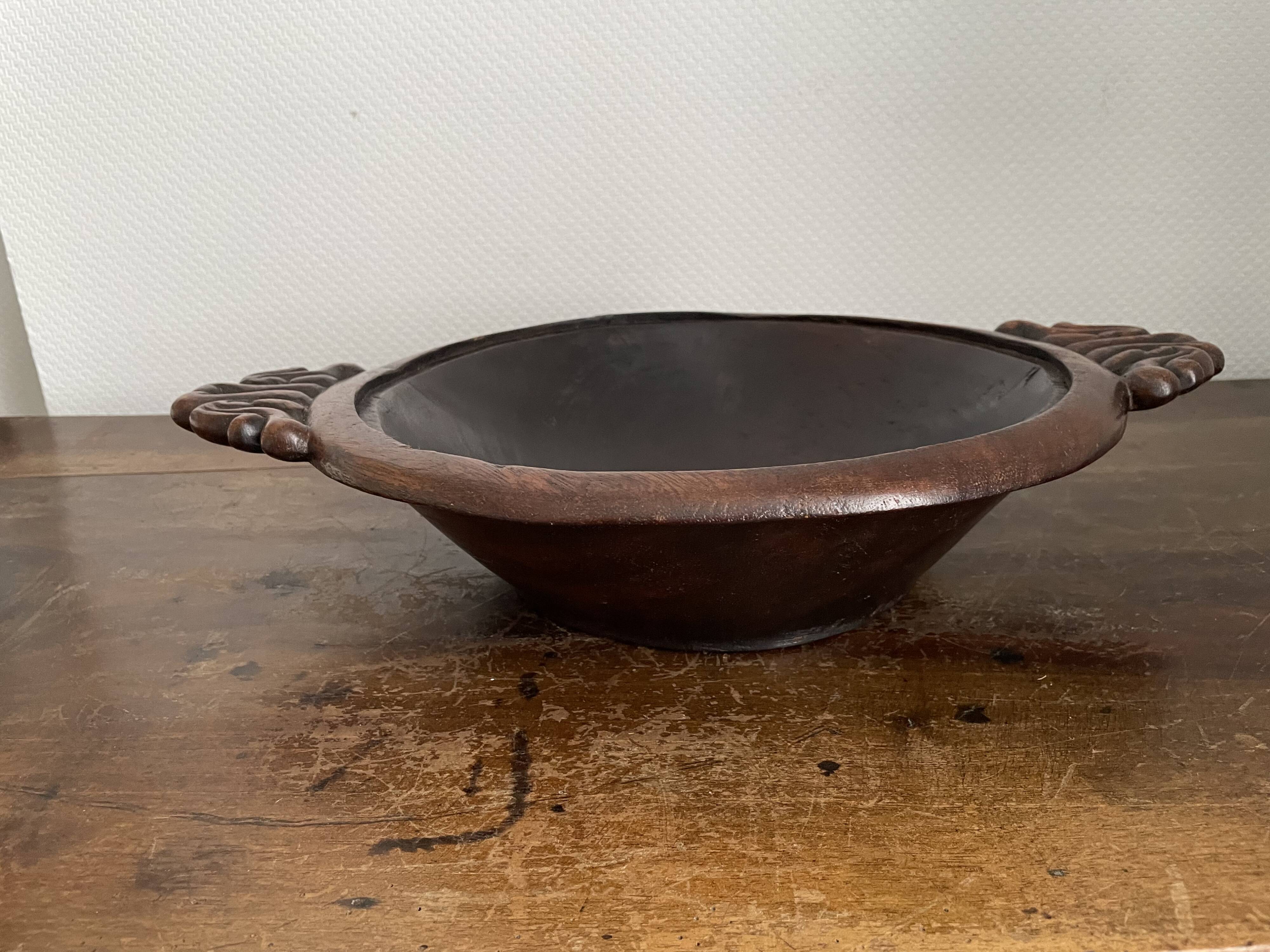 Hollow carved wooden dish