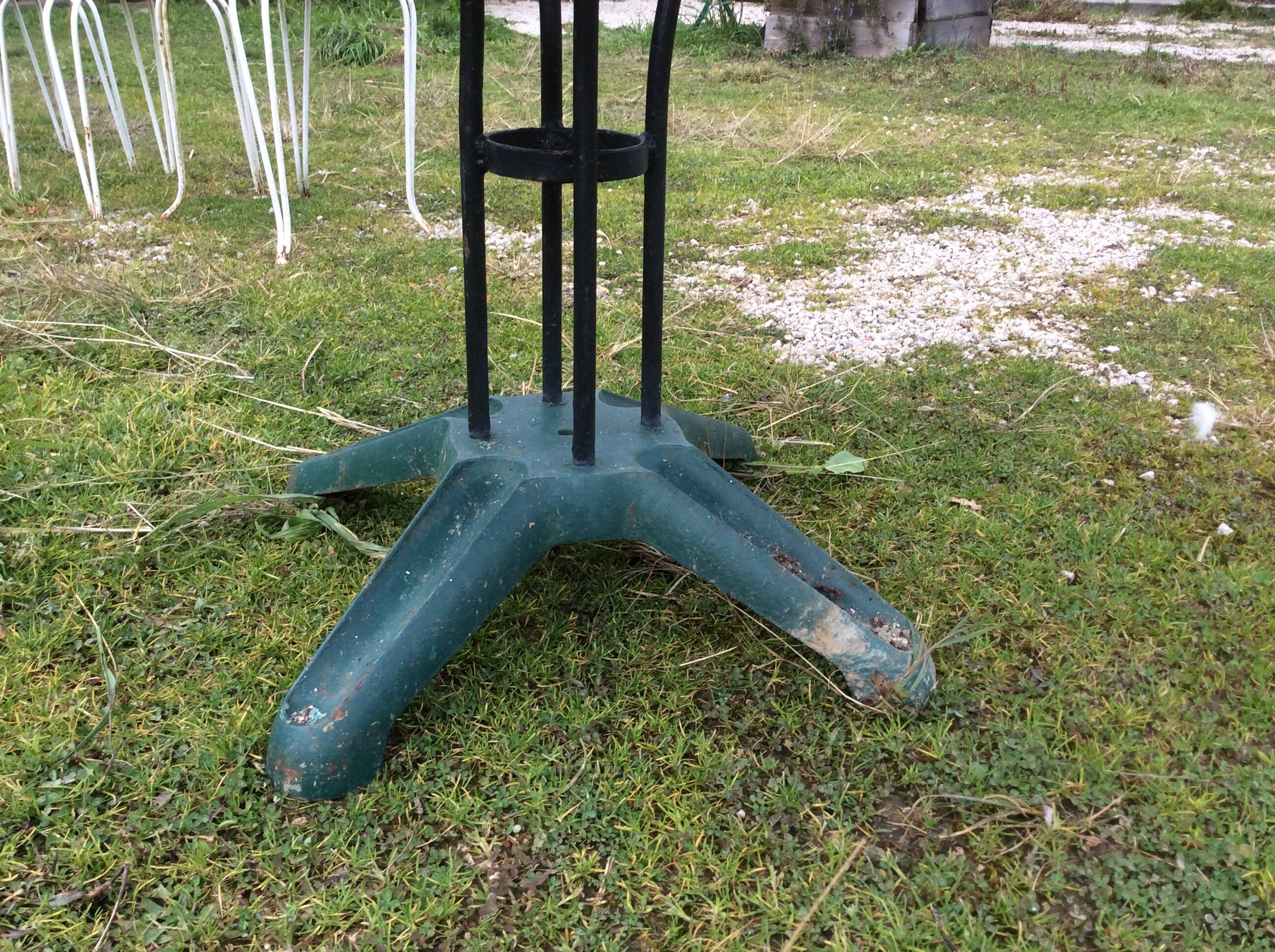 Two metal garden tables make up