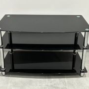 Modern chest of drawers with stainless steel and smoked glass