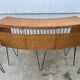 Vintage 1950s bar counter with its two rattan and metal stools.