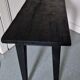 Table basse en bois brûlé