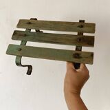 Low stool with wooden and metal slats