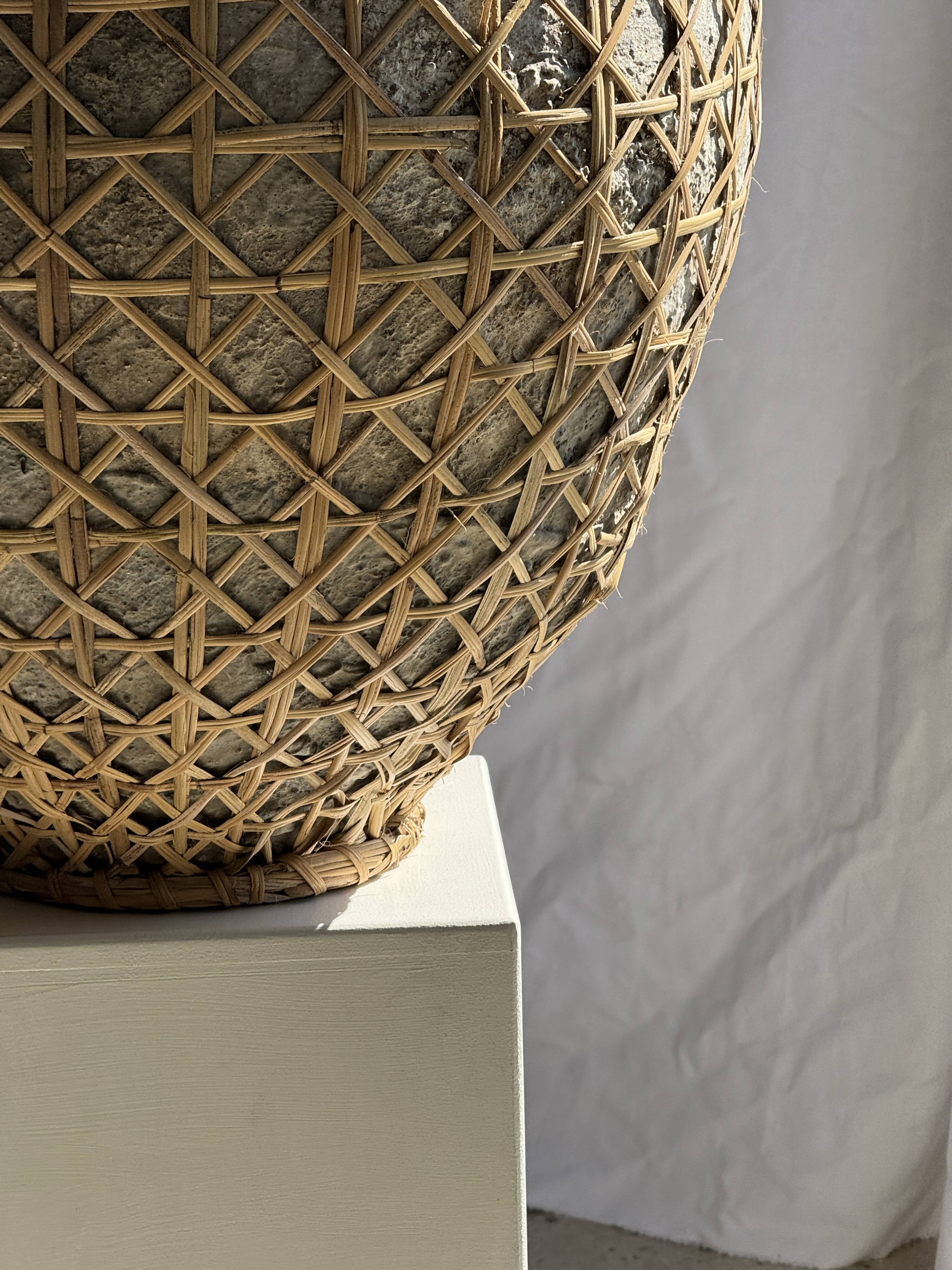 Immense light grey antique-style pot with a crosshatch lid and handles.